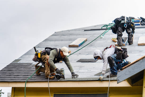 Professional Gutter Installation technician working in Freeport, ME